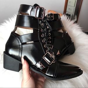 Black cut out patent booties